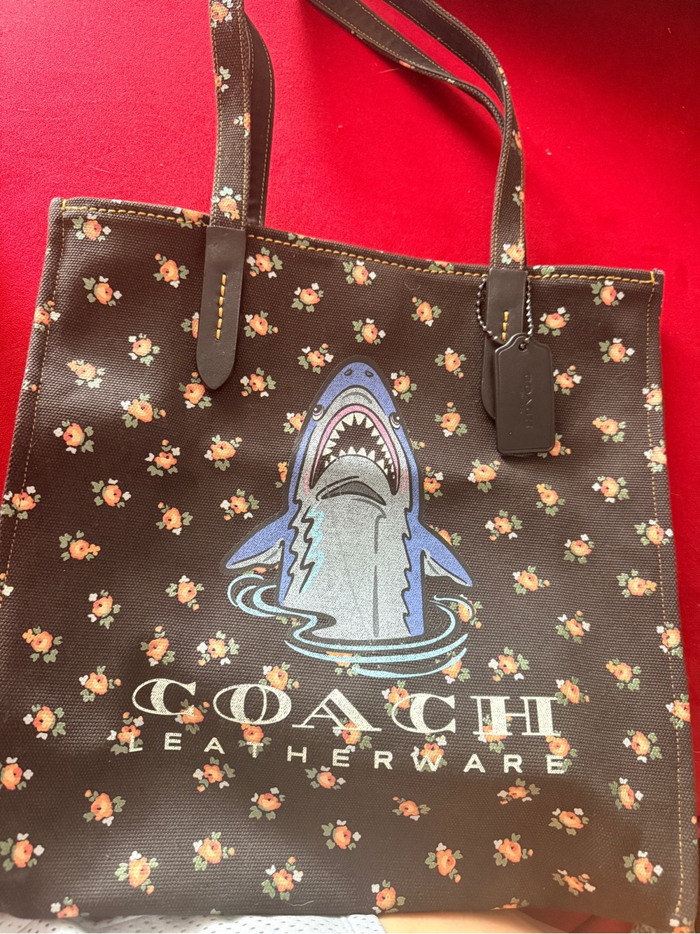 Coach Brown Floral Tote with Orange Accent